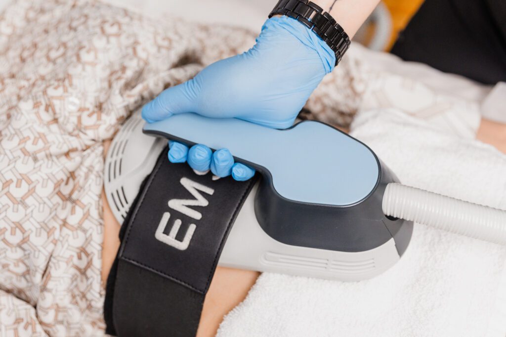 Non-invasive body contouring treatment with advanced equipment at a plastic surgery center.