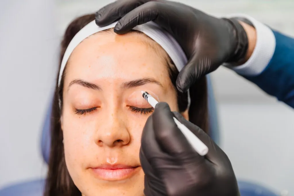 Patient receiving cosmetic procedure at a plastic surgery center.